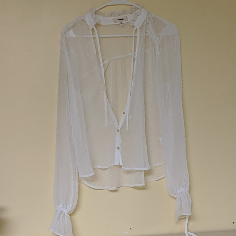 White ruffled collar blouse